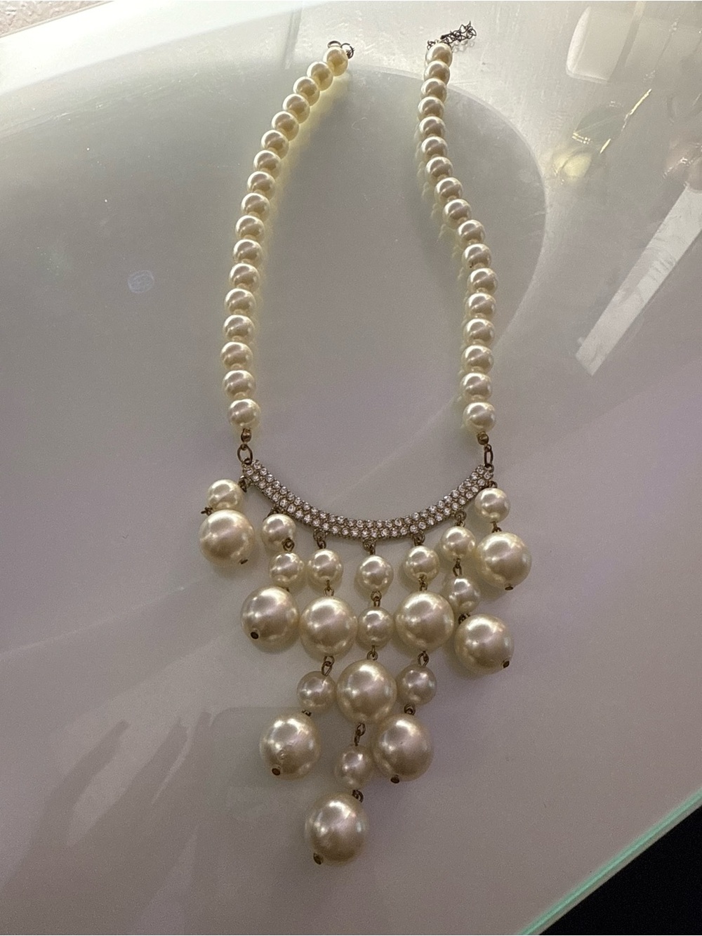 Elegant Pearl Cascade Statement Necklace - Cream Pearls with Rhinestone Bar